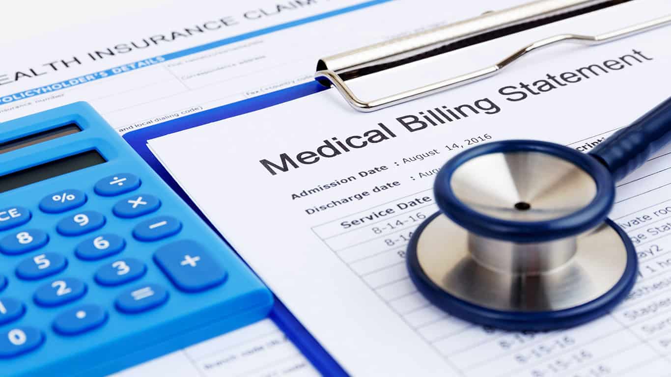 medical billing statement on clip board