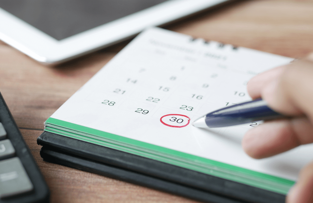 Close-up of a calendar with a date circled in red, symbolizing Pennsylvania workers’ compensation claim deadlines.